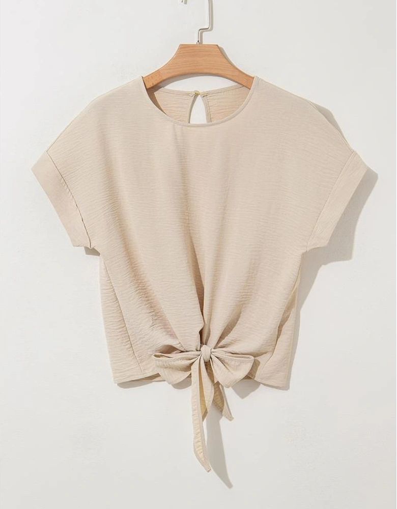 Parchment Solid Color Knotted Hem Short Sleeve Blouse