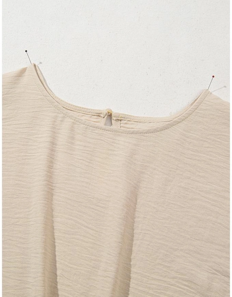 Parchment Solid Color Knotted Hem Short Sleeve Blouse