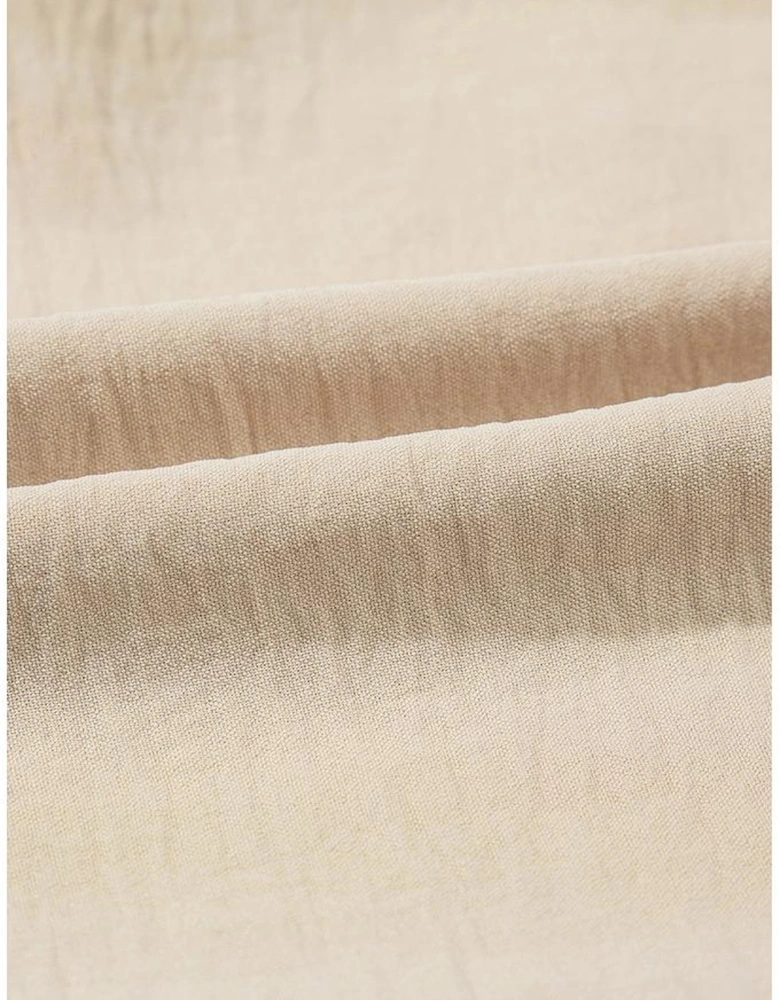 Parchment Solid Color Knotted Hem Short Sleeve Blouse