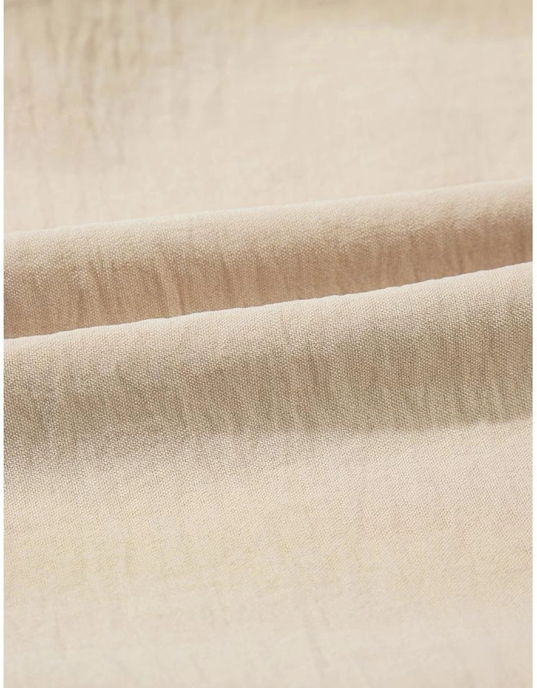 Parchment Solid Color Knotted Hem Short Sleeve Blouse