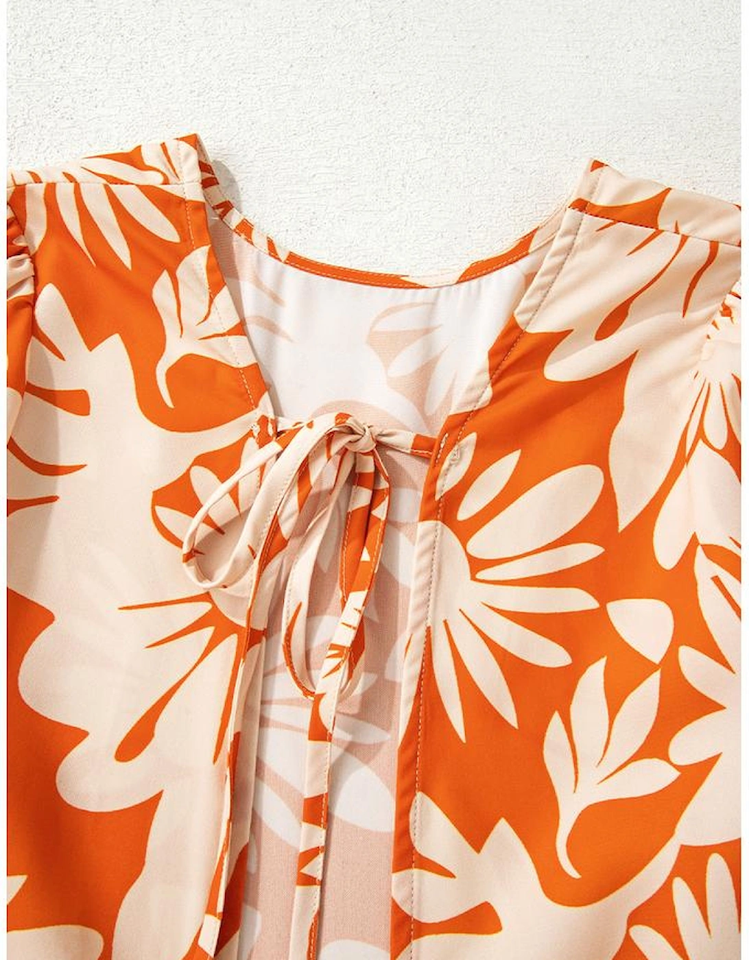 Orange Floral Print Knotted Open Back Long Sleeve Blouse