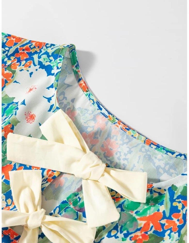 Green Floral Print Bow Applique Slit Sleeveless Peplum Blouse