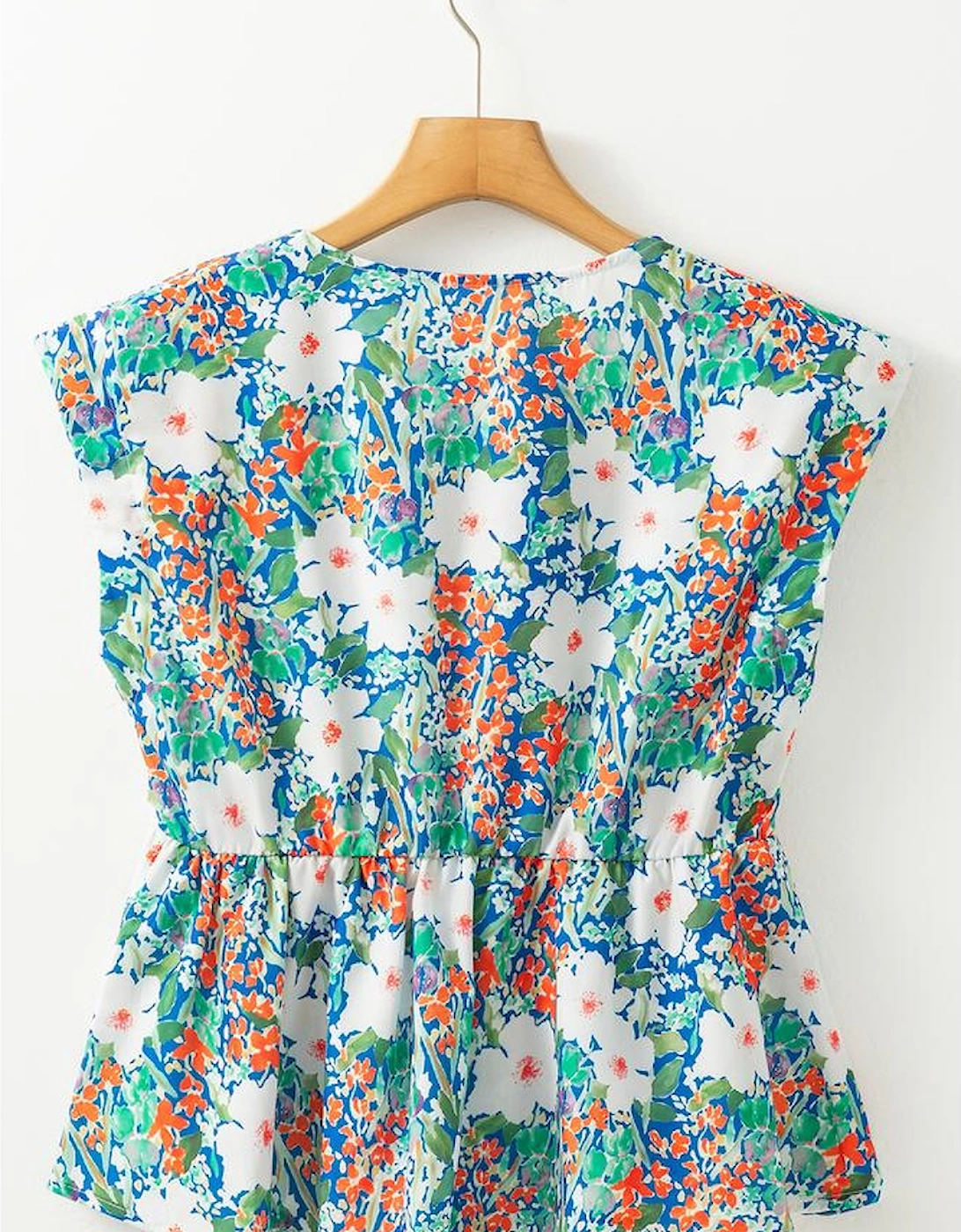 Green Floral Print Bow Applique Slit Sleeveless Peplum Blouse