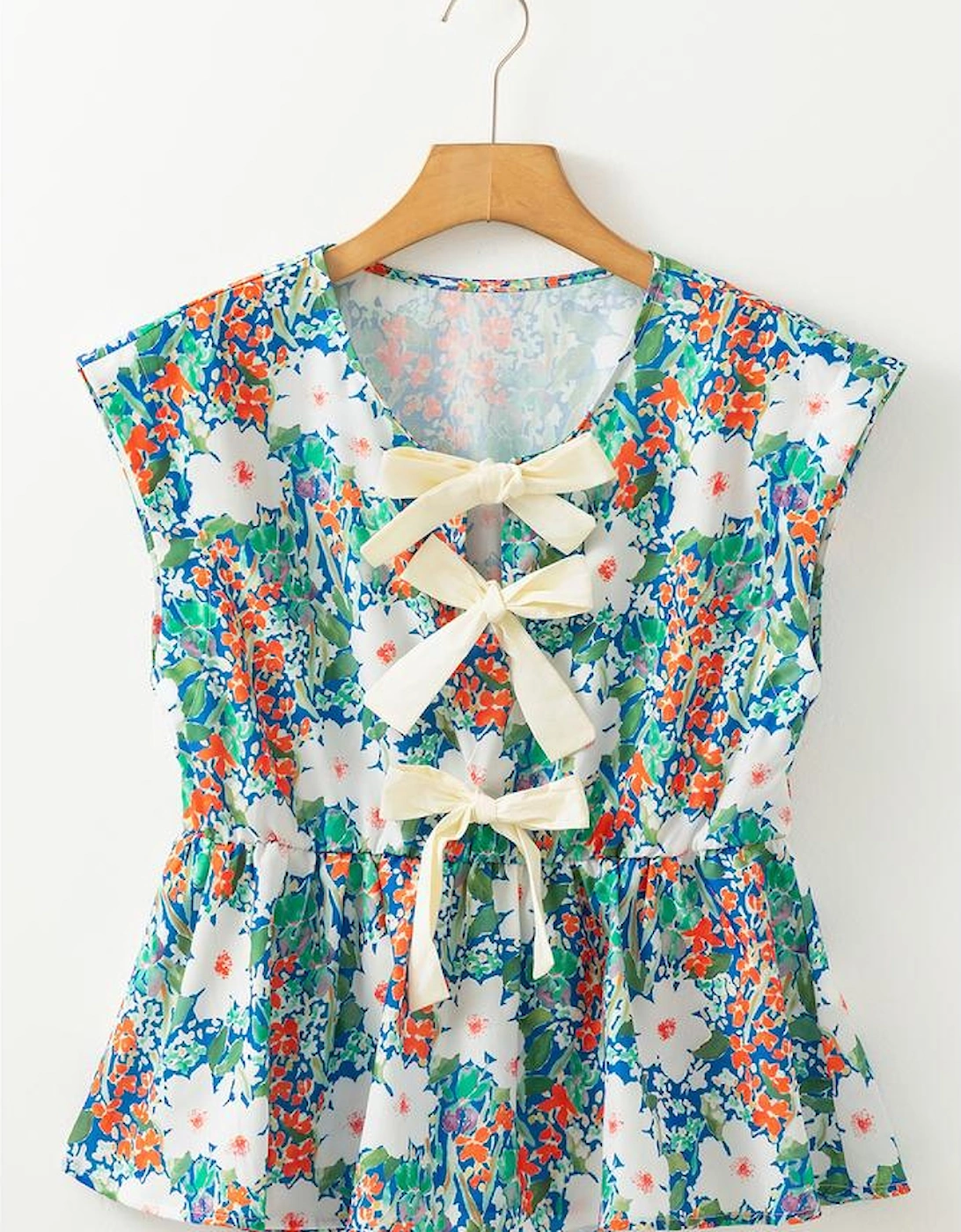 Green Floral Print Bow Applique Slit Sleeveless Peplum Blouse