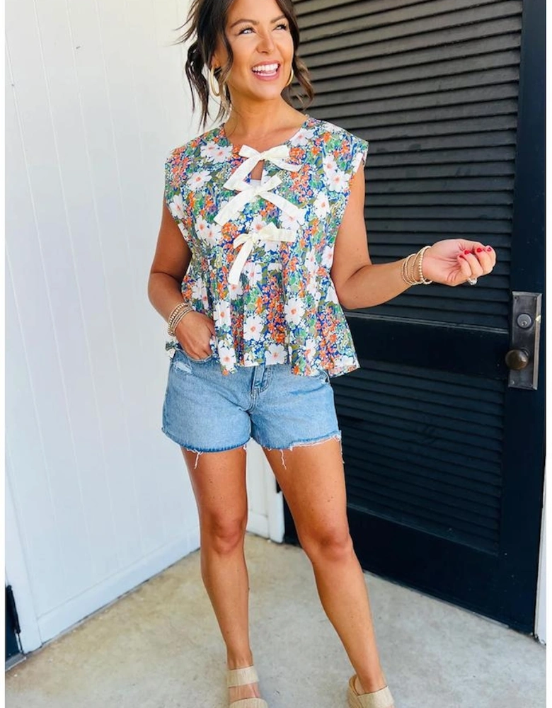 Green Floral Print Bow Applique Slit Sleeveless Peplum Blouse