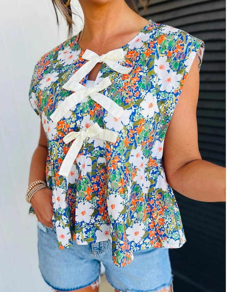 Green Floral Print Bow Applique Slit Sleeveless Peplum Blouse