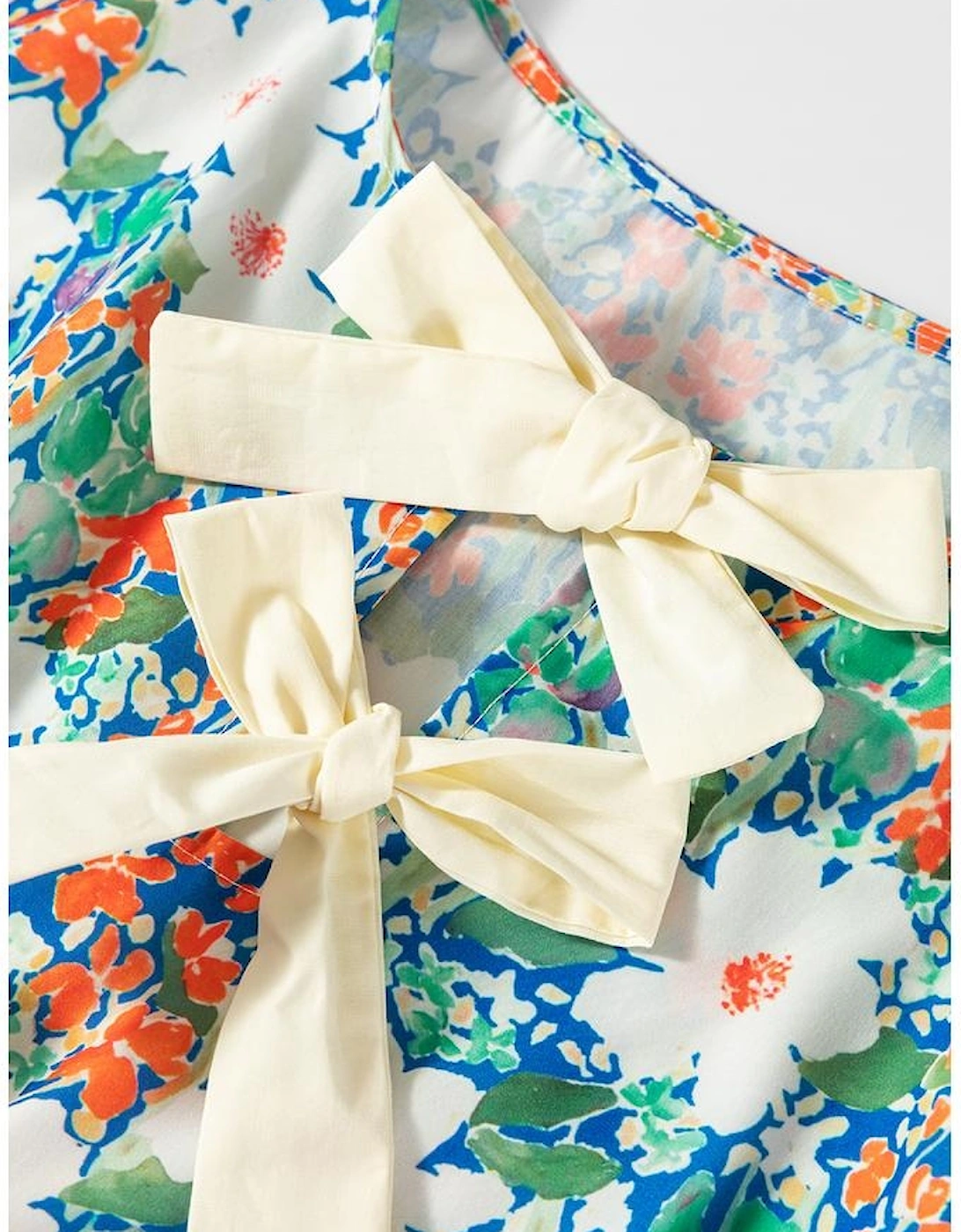 Green Floral Print Bow Applique Slit Sleeveless Peplum Blouse