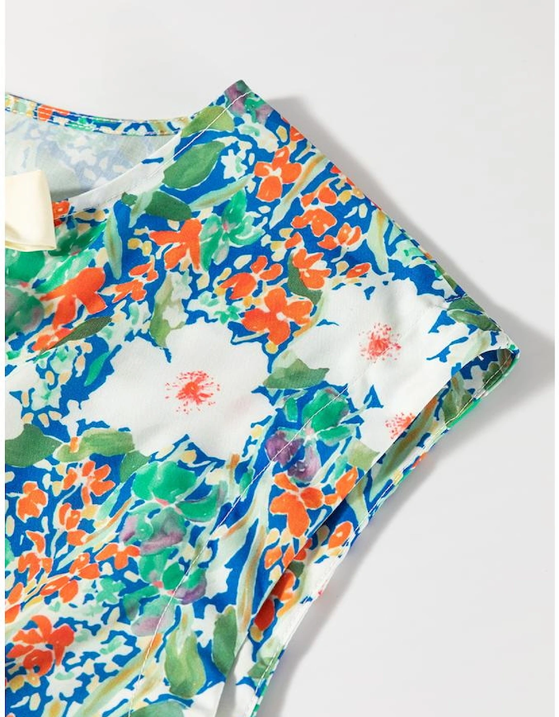 Green Floral Print Bow Applique Slit Sleeveless Peplum Blouse