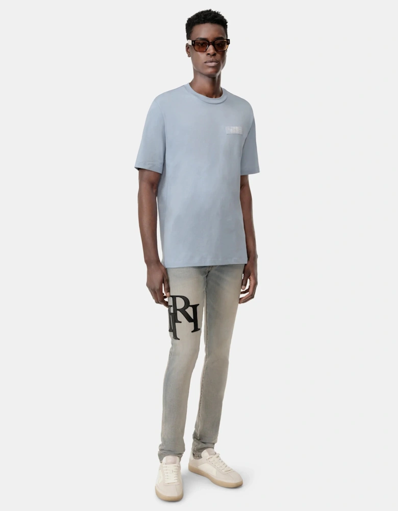 Staggered Logo Skinny Jeans Light Blue