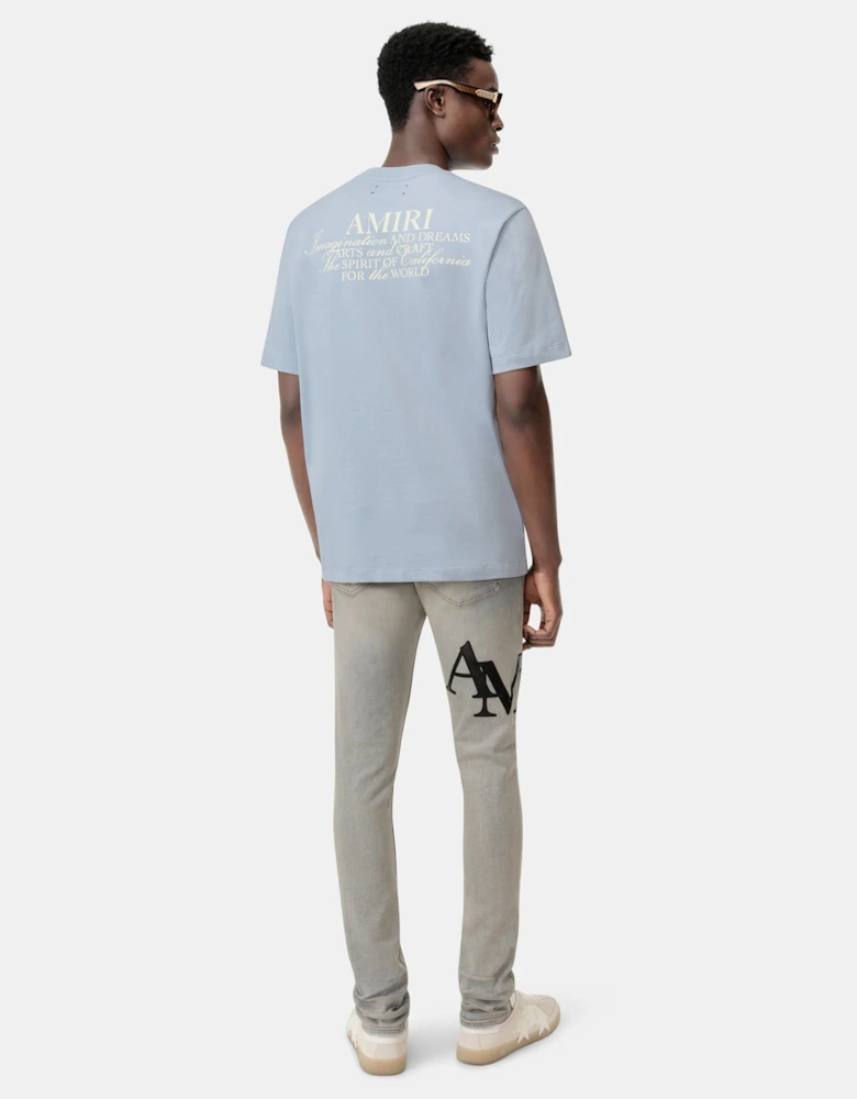 Staggered Logo Skinny Jeans Light Blue