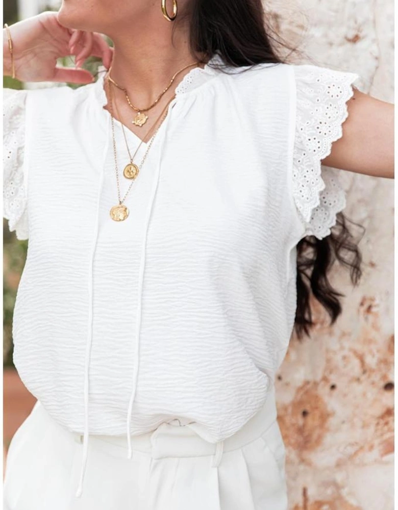 White Embroidered Ruffle Trim Textured Blouse