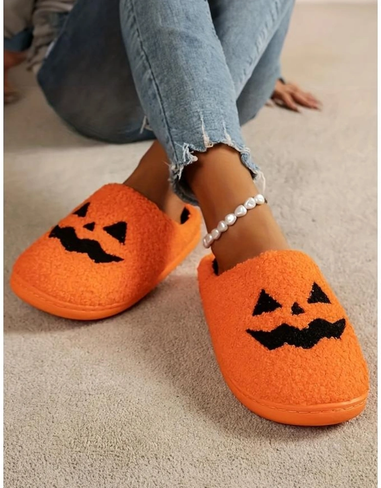 Orange Halloween Pumpkin Face Graphic Plush Slippers