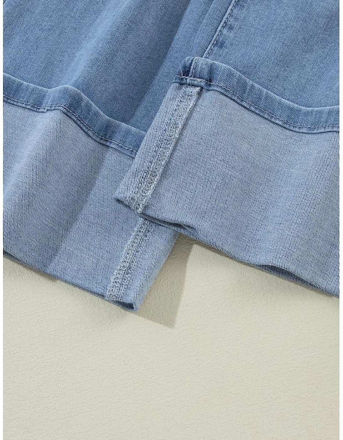 Dusk Blue High Rise Asymmetric Button Zip Fly Ripped Jeans