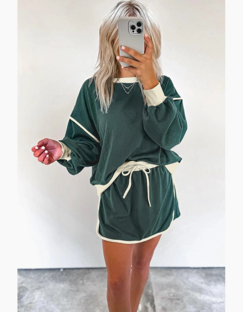 Evergreen Color Contrast Loose Pullover and Lace-up Waist Skort Set