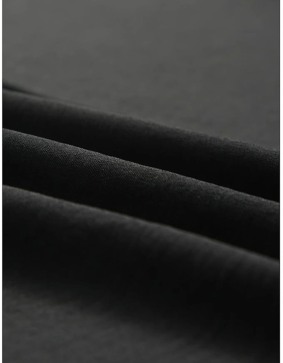 Black Smocked Wrist Shift Top