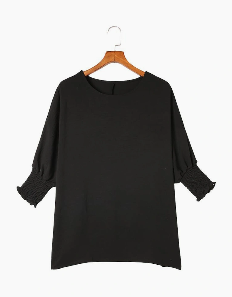 Black Smocked Wrist Shift Top