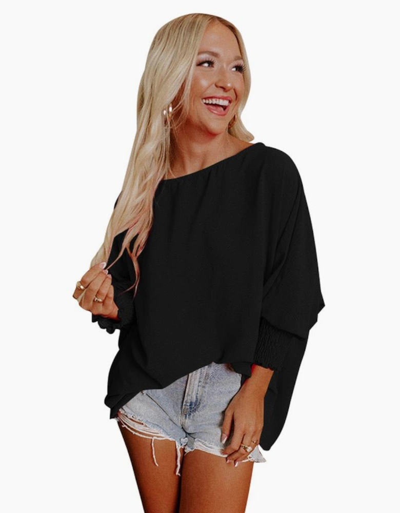 Black Smocked Wrist Shift Top