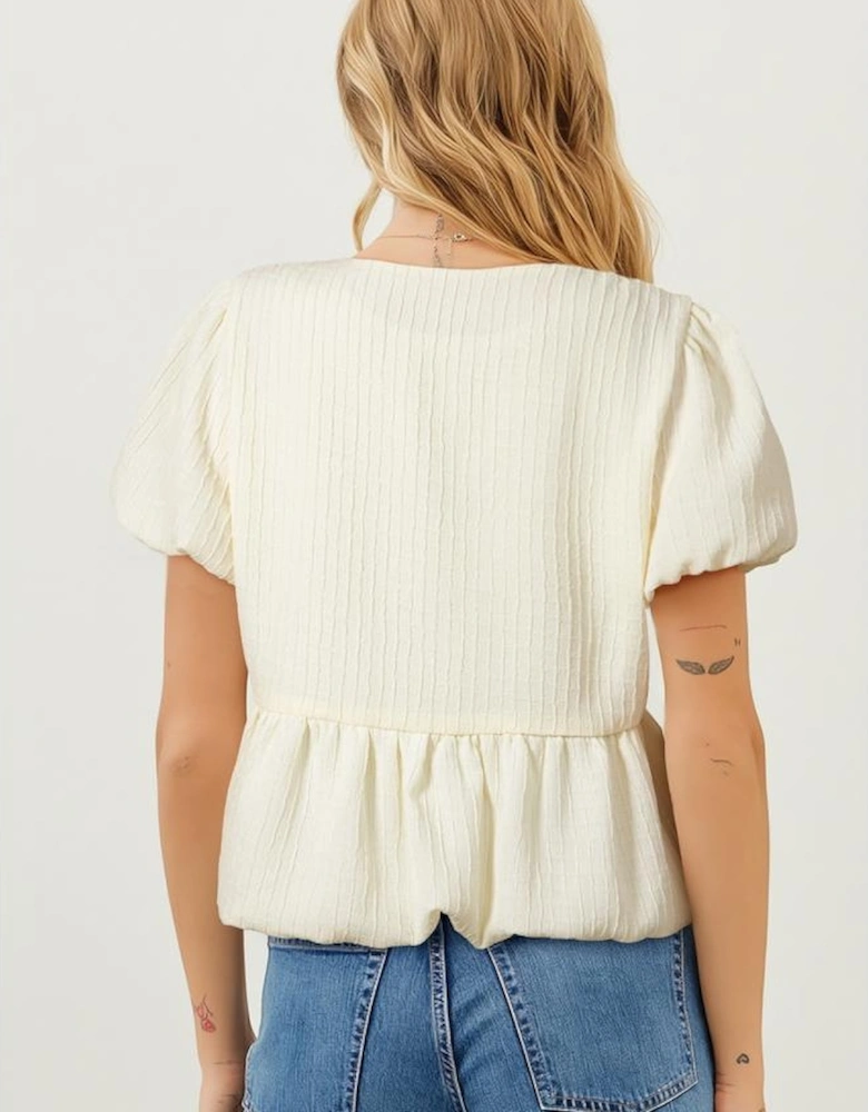 White Textured Bow Ties Front Bubble Hem Puff Short Sleeve Blouse