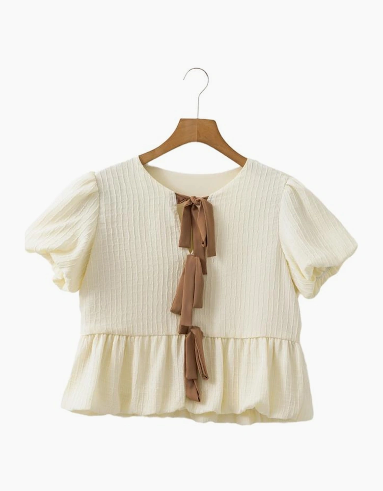 White Textured Bow Ties Front Bubble Hem Puff Short Sleeve Blouse