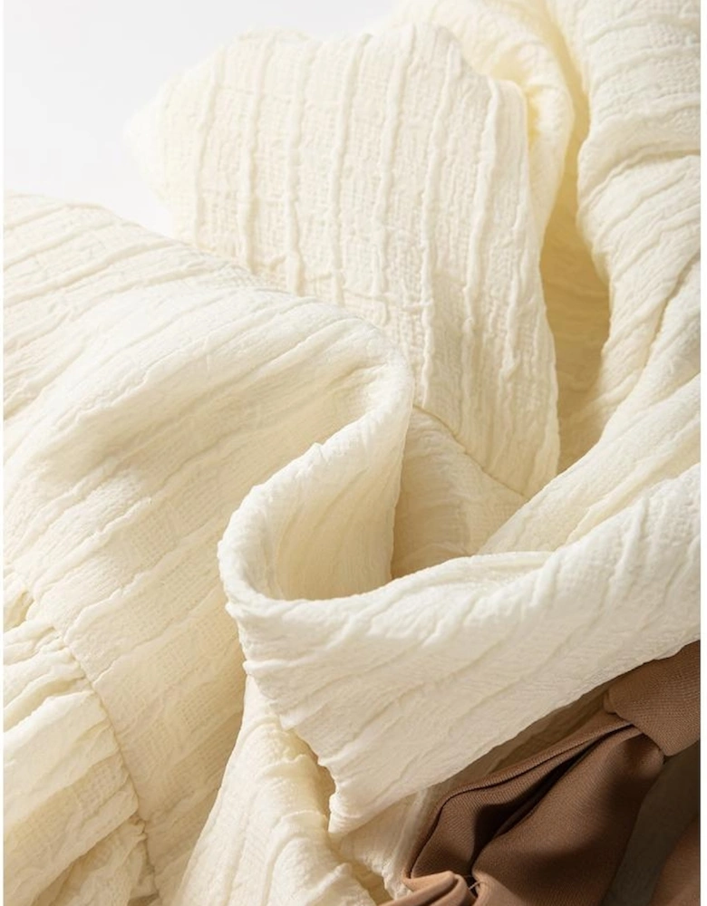 White Textured Bow Ties Front Bubble Hem Puff Short Sleeve Blouse