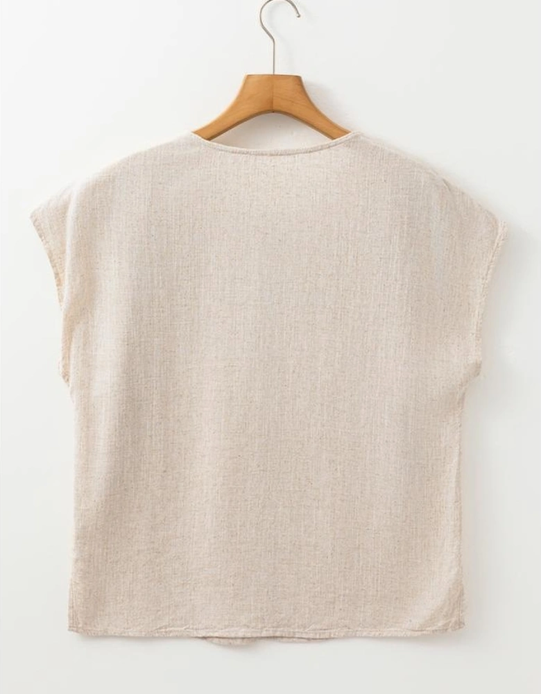 Jet Stream Geometric Embroidered Short Sleeve Tassel Tied V Neck Blouse