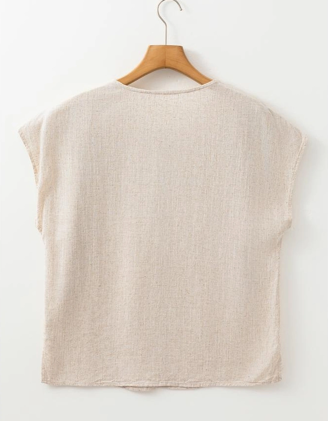 Jet Stream Geometric Embroidered Short Sleeve Tassel Tied V Neck Blouse