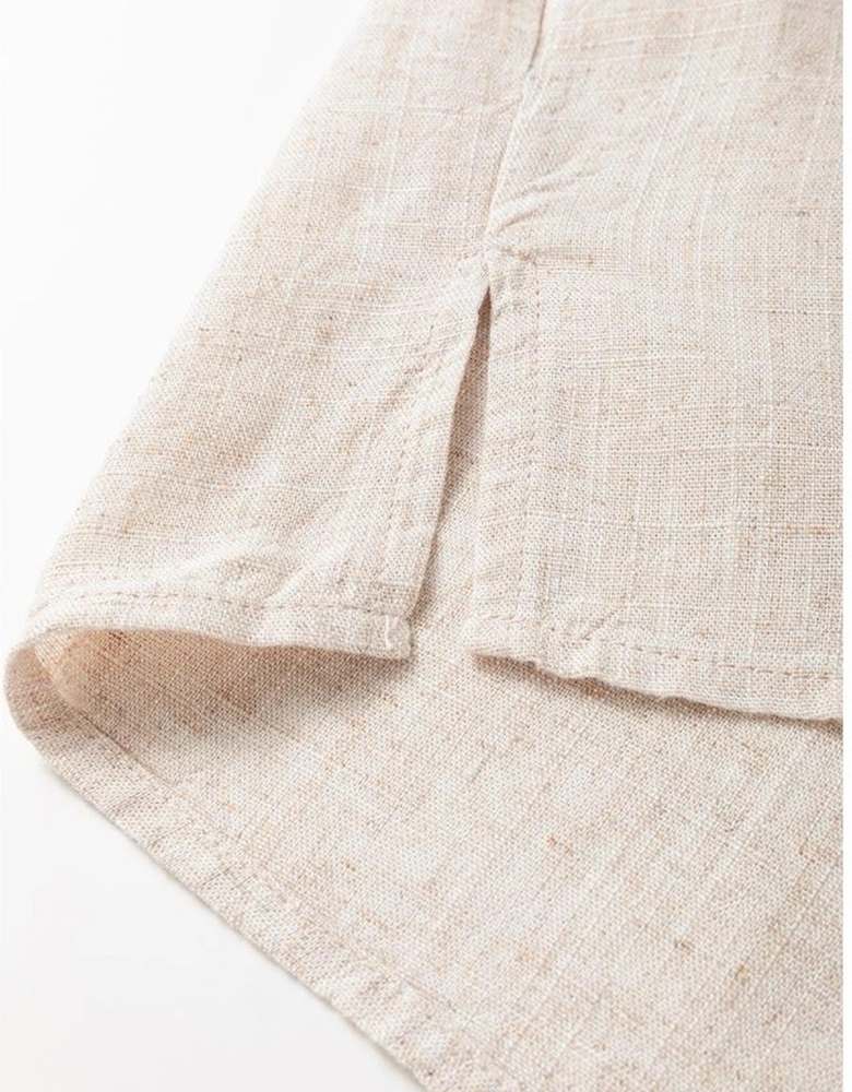 Jet Stream Geometric Embroidered Short Sleeve Tassel Tied V Neck Blouse