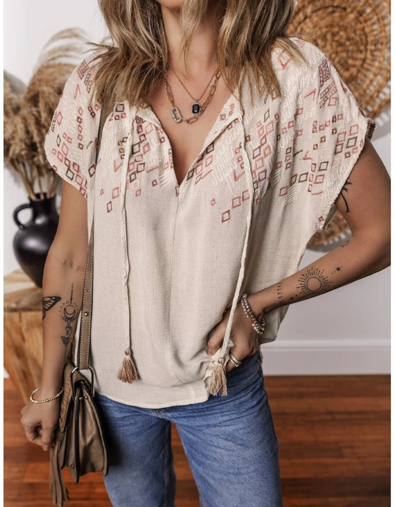 Jet Stream Geometric Embroidered Short Sleeve Tassel Tied V Neck Blouse