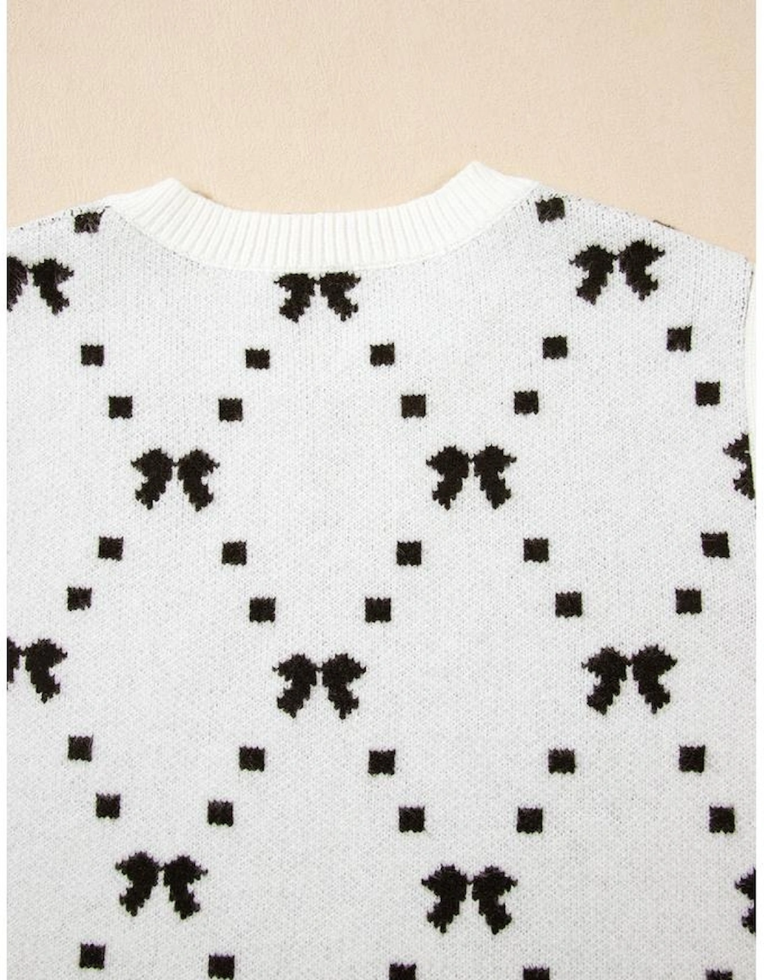 White Bow Pattern Buttoned Side Cropped Sweater Vest