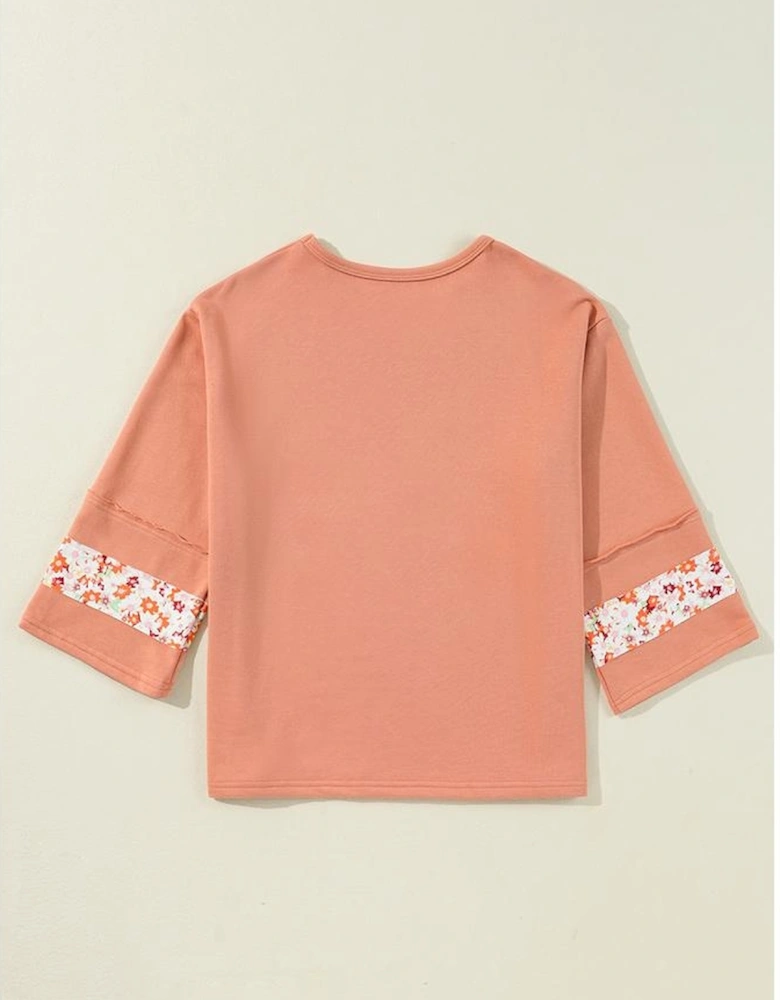 Grapefruit Orange Flower Patch Graphic Exposed Seam Wide Sleeve Top