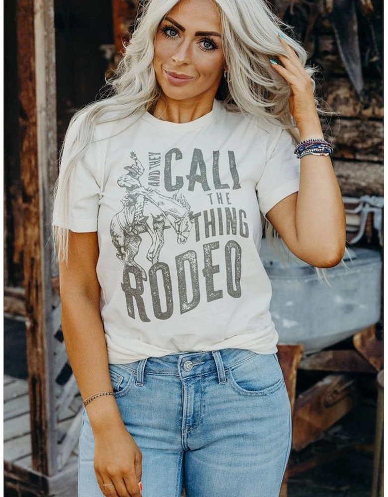 White AND THEY CALL THE THING RODEO Print Round Neck T Shirt