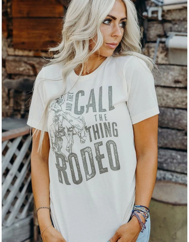 White AND THEY CALL THE THING RODEO Print Round Neck T Shirt