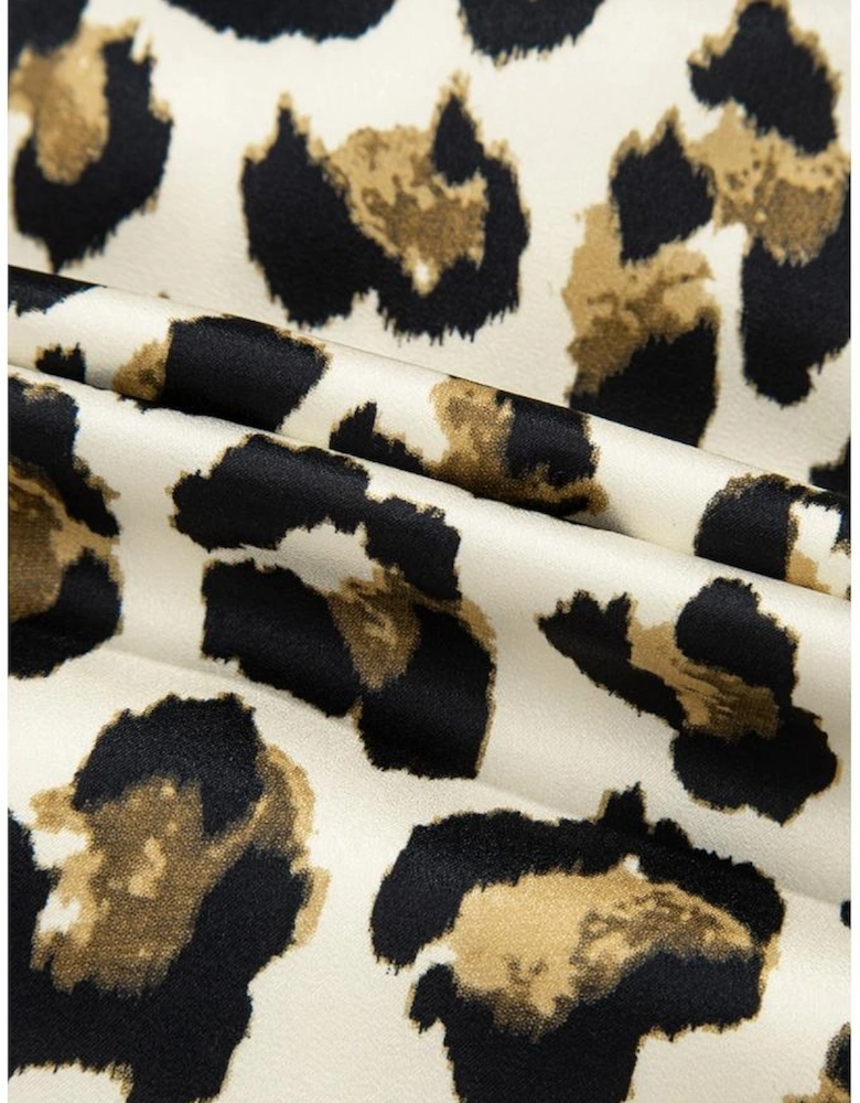 Apricot Leopard Bubble Sleeve Bow Tie Front Peplum Blouse