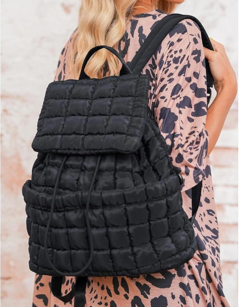 Black Solid Flapped Quilted Puffer Backpack