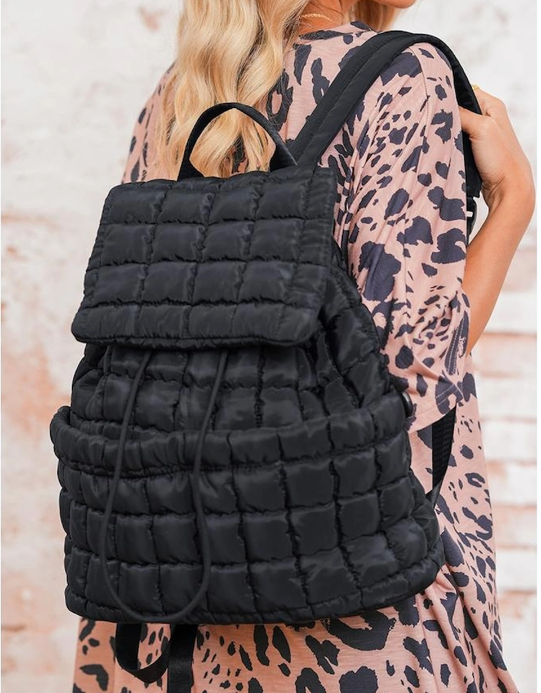 Black Solid Flapped Quilted Puffer Backpack
