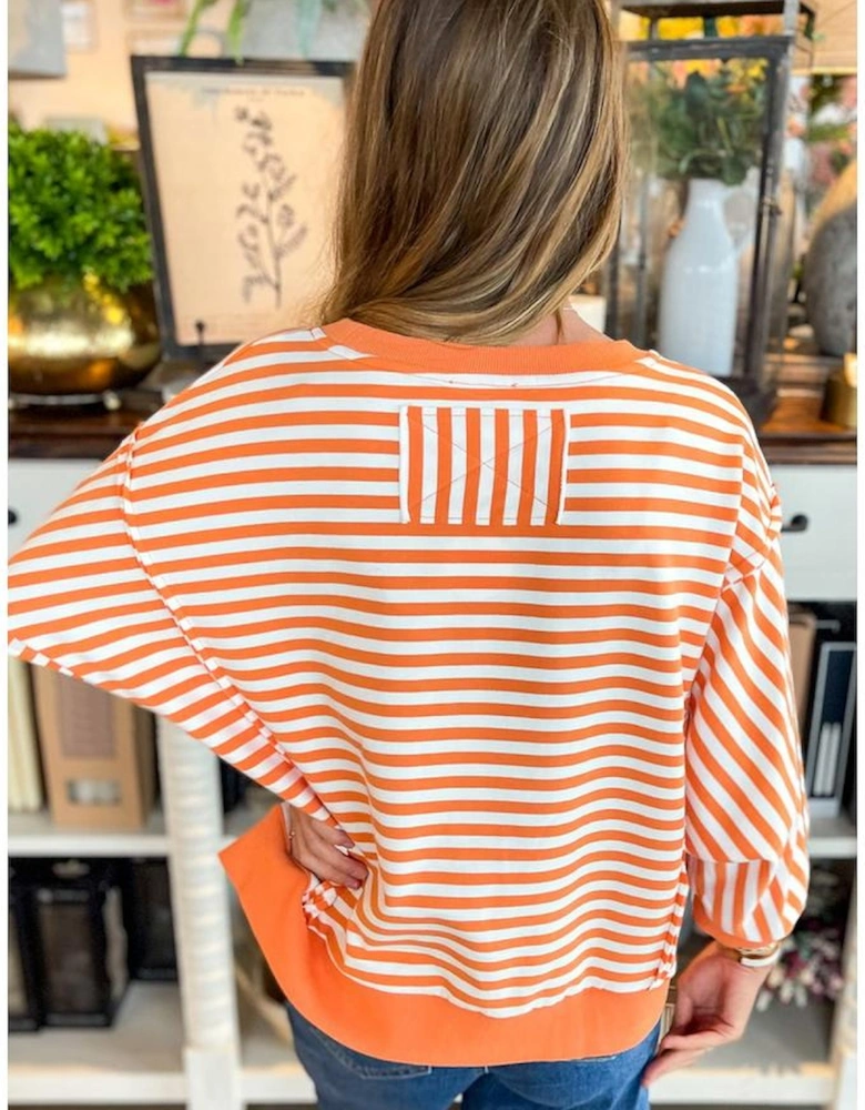 Orange Stripe Exposed Seam Drop Shoulder Casual Pullover Top