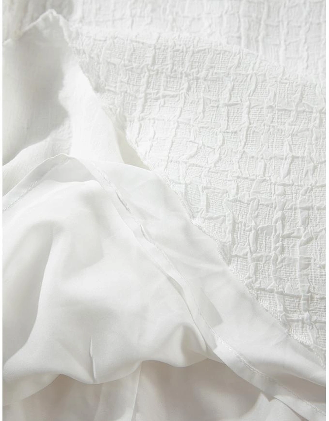 White Textured Frilled High Neck Sleeveless Ruffled Mini Dress