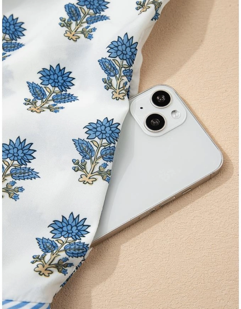 Sky Blue Floral Puff Sleeve Tied Neck Pocketed Mini Dress