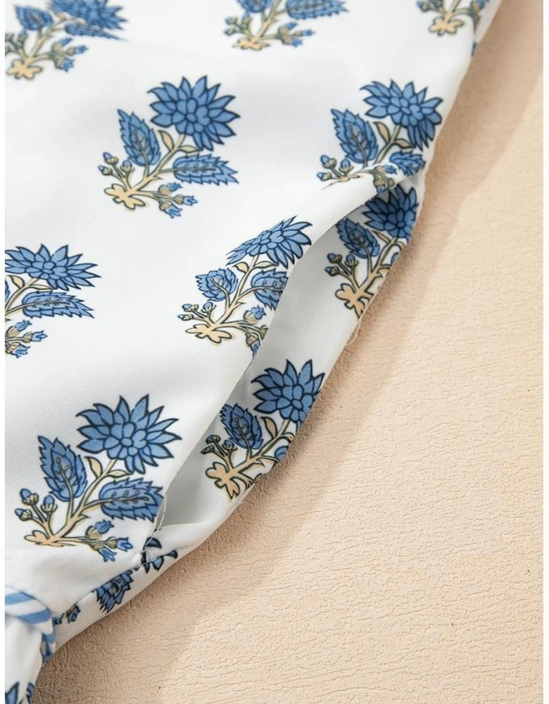 Sky Blue Floral Puff Sleeve Tied Neck Pocketed Mini Dress