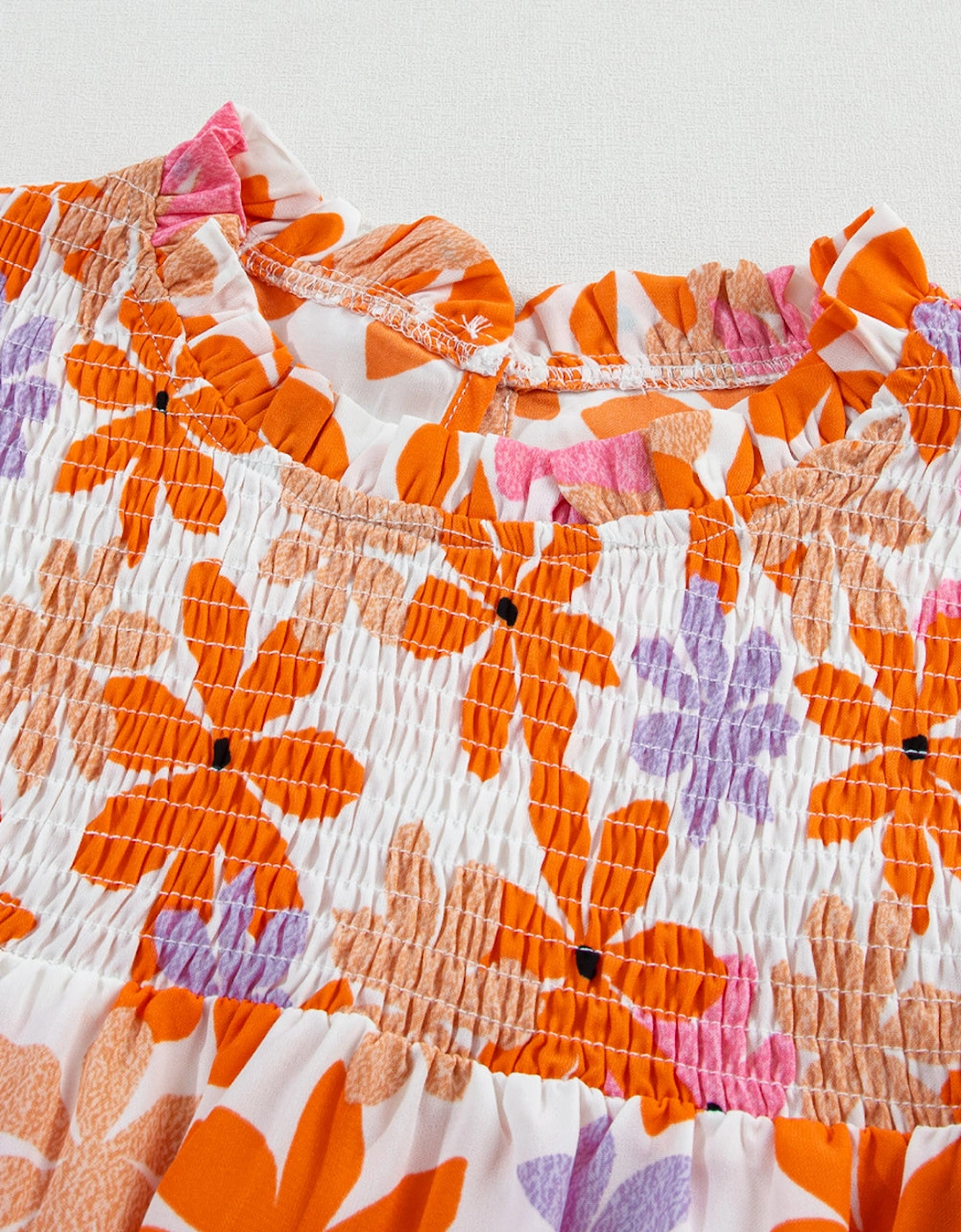 Orange Ruffled Sleeve Smocked Floral Top
