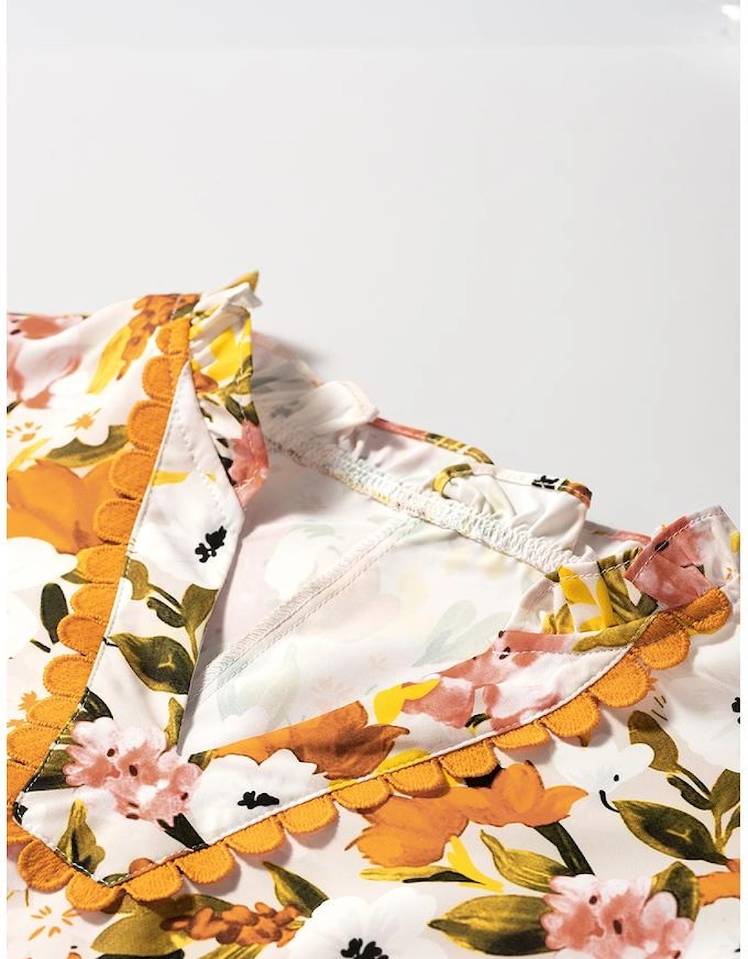 Russet Orange Ruffled V Neck Scalloped Short Sleeve Floral Blouse