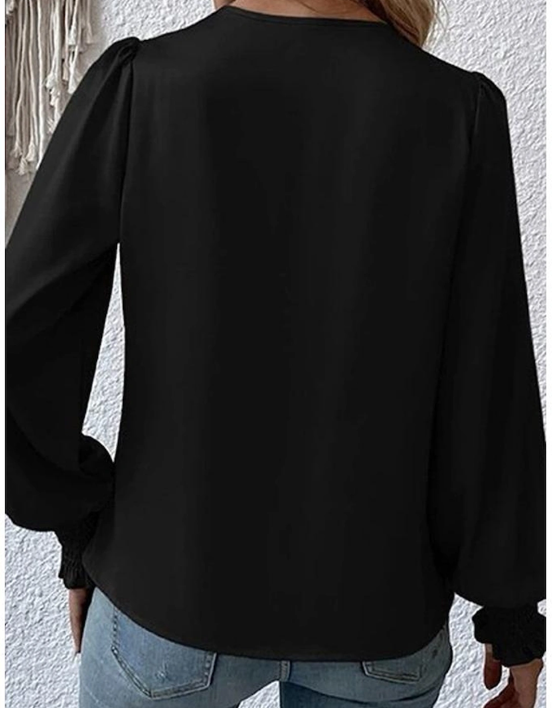 Black Solid Surplice Neck Shirred Cuffs Draped Blouse