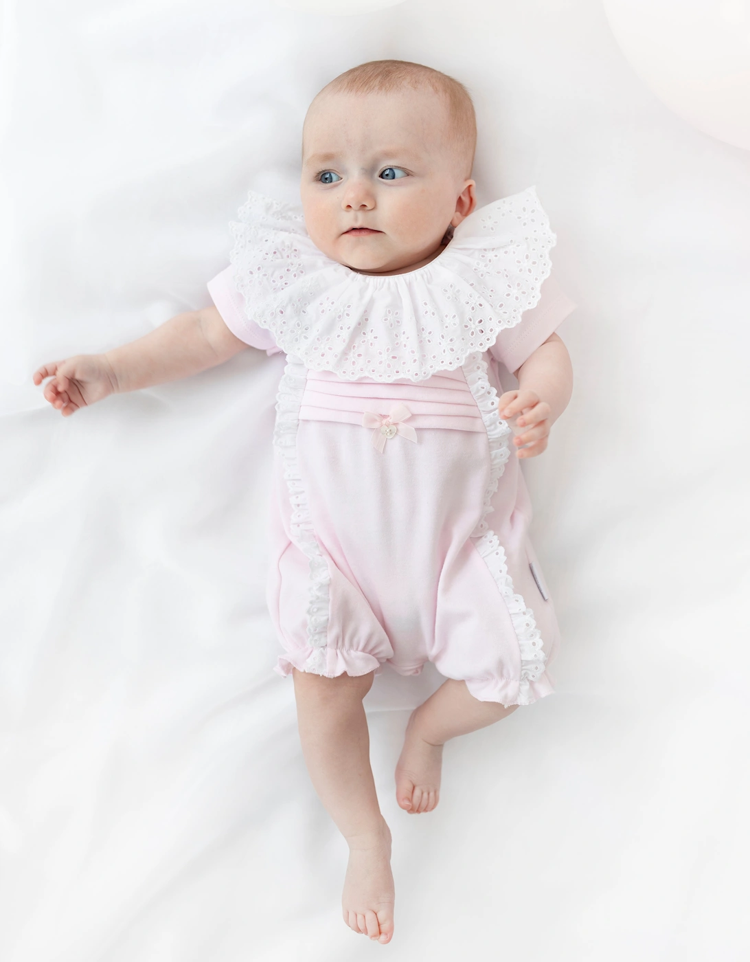 Girls Pale Pink Broderie Jersey Romper