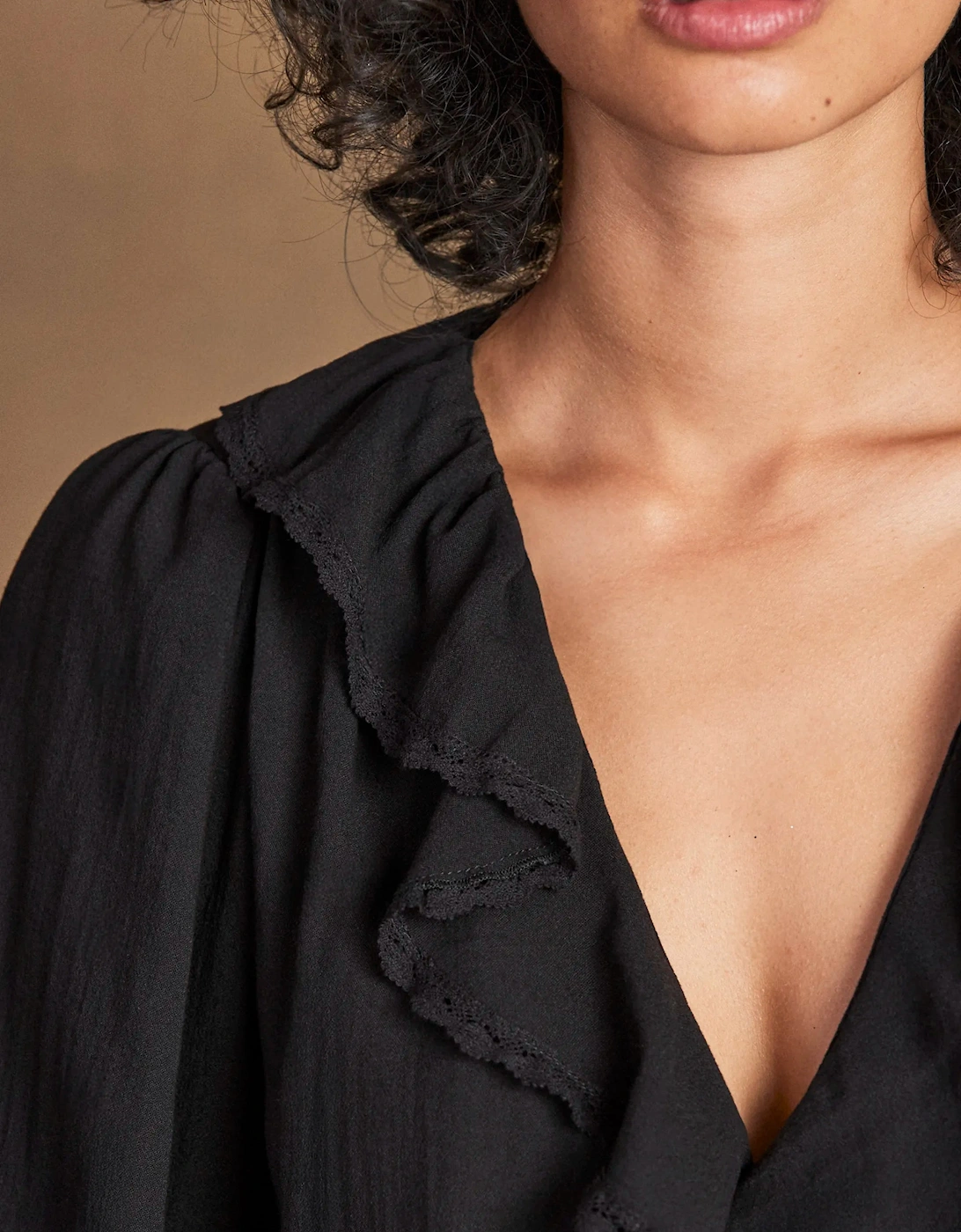 Black Ruffle-Front Blouse