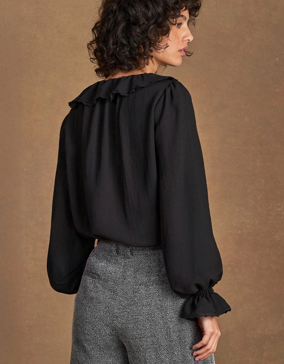 Black Ruffle-Front Blouse
