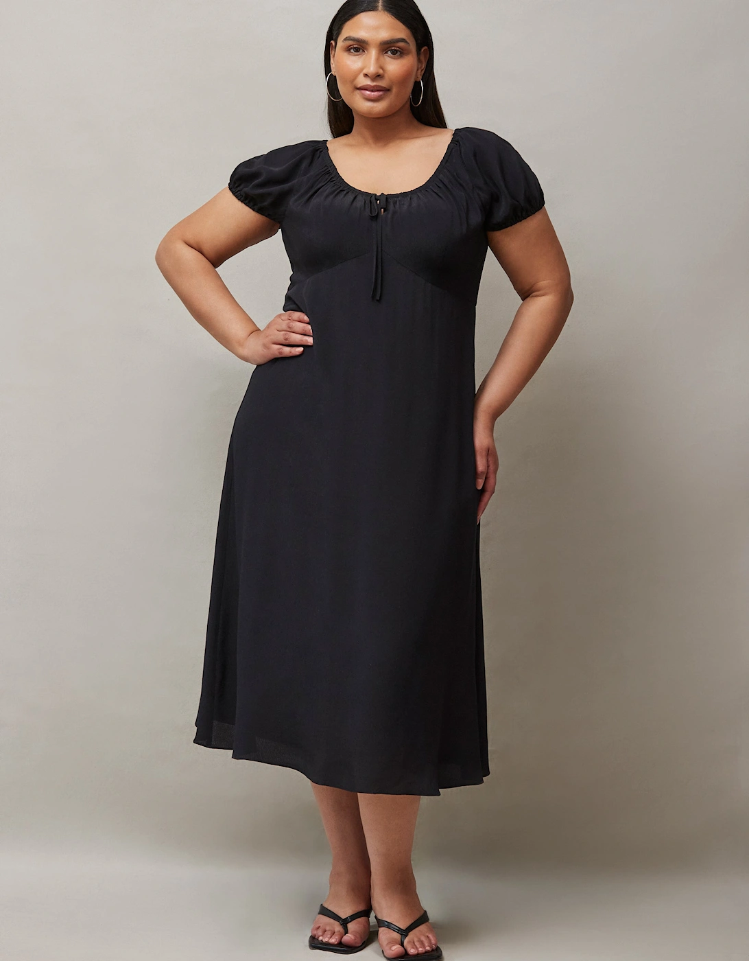 Black Dress With Ruched Neckline