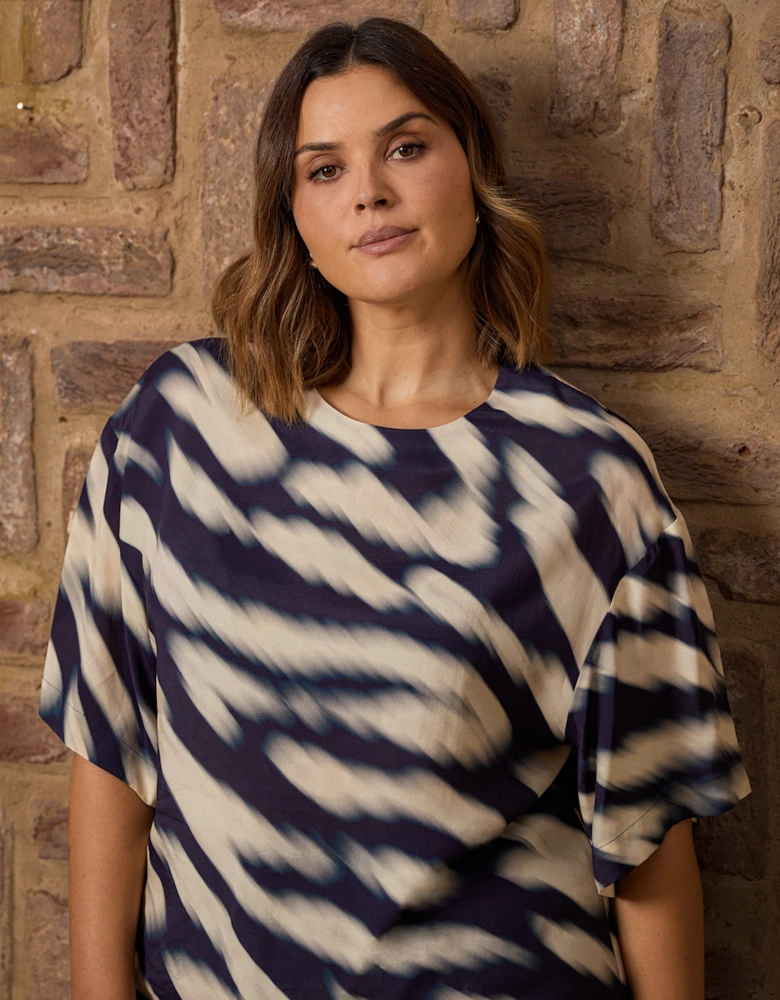 Blurred Animal Print Elevated Woven Top