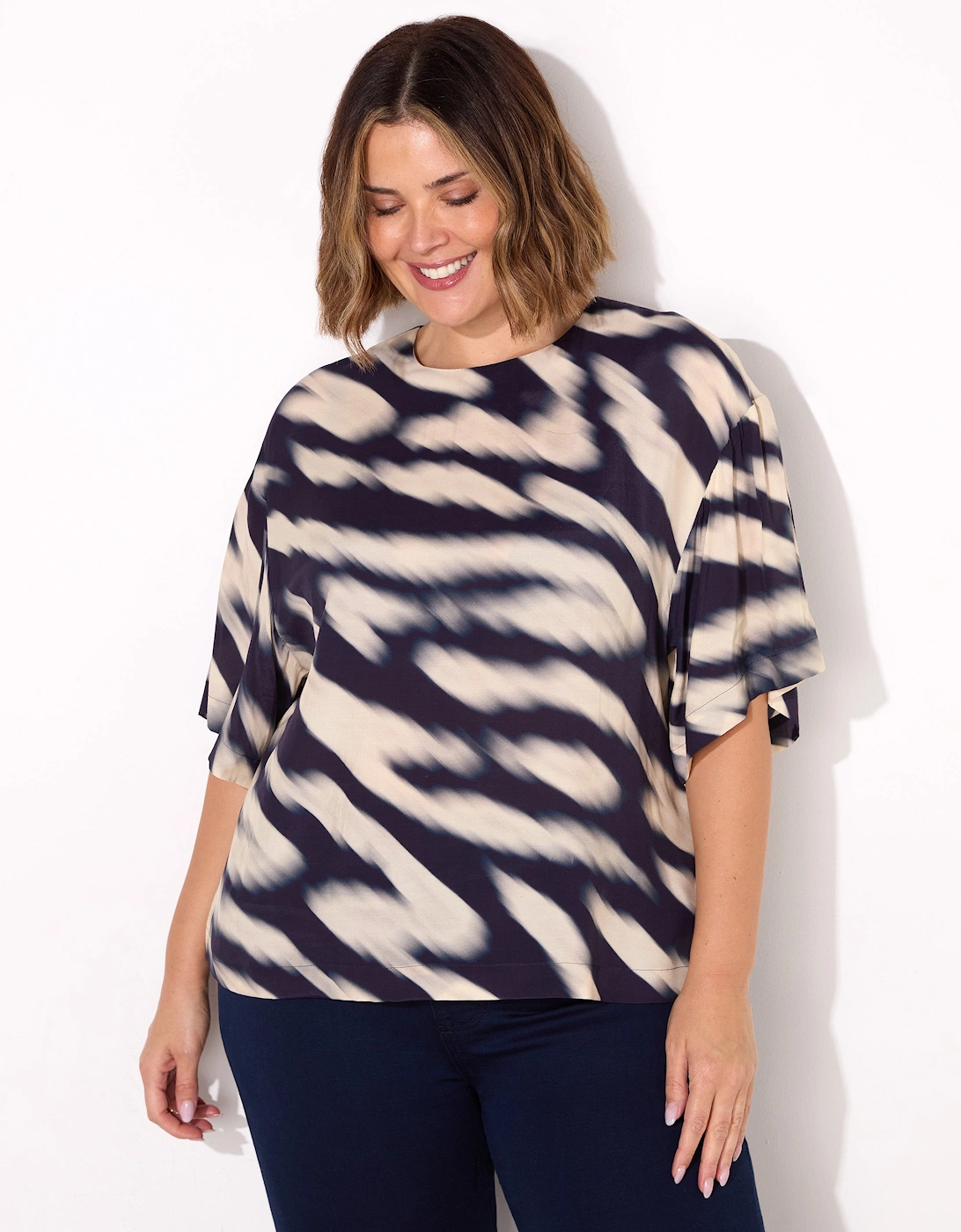 Blurred Animal Print Elevated Woven Top