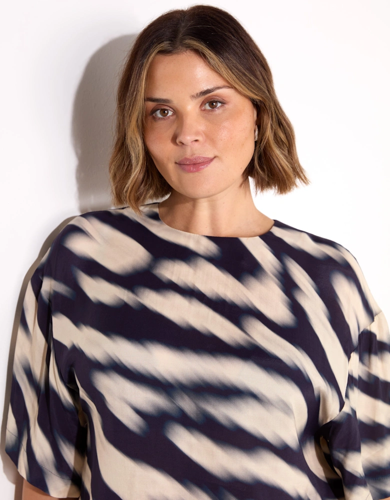 Blurred Animal Print Elevated Woven Top