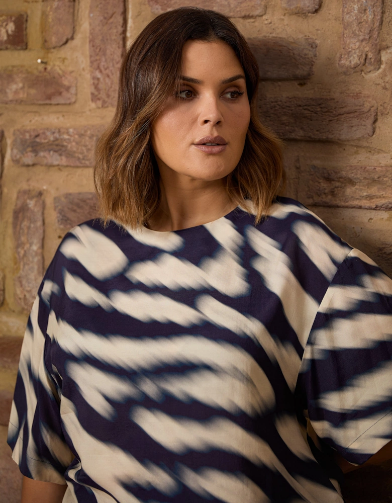 Blurred Animal Print Elevated Woven Top